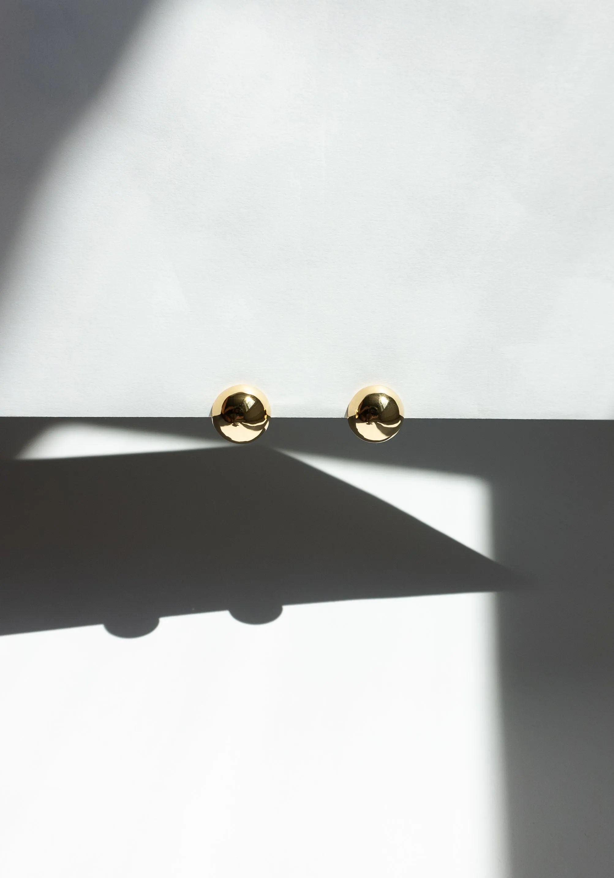 Hemisphere Earrings in Gold